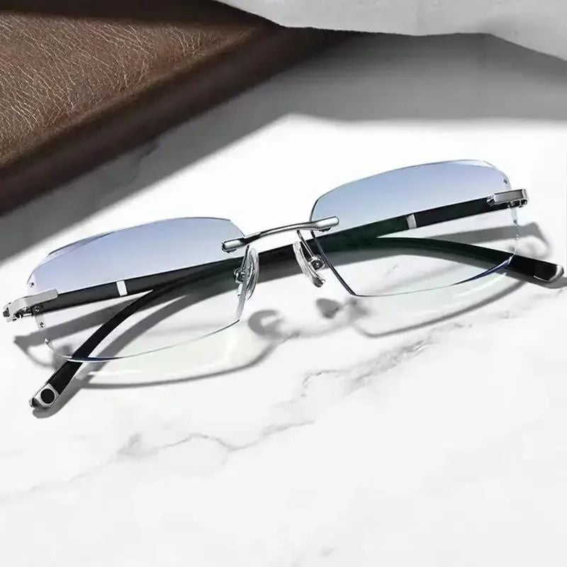 Unisex rimless cut edge glasses with anti-blue clear lenses for business.