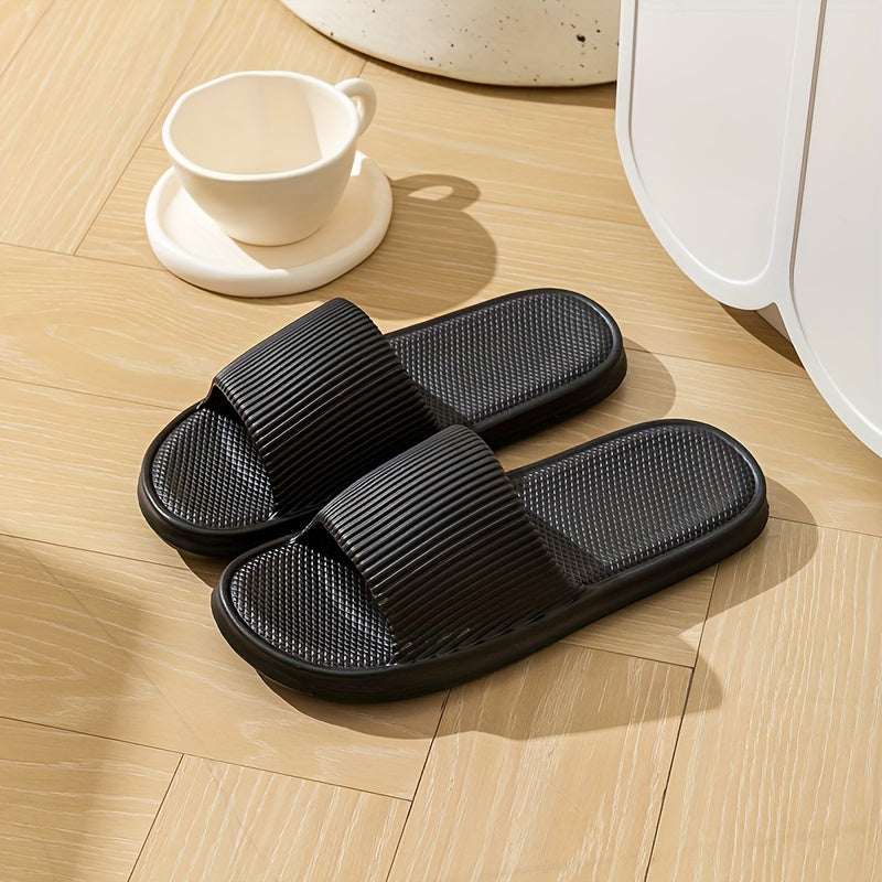 Gender-neutral EVA pillow slides with solid color, lightweight soft sole for home and beach comfort.