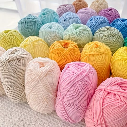 5-Pack of premium 4-ply milk cotton yarn in assorted colors for knitting and crochet projects, 69.95 meters each. Ideal for making sweaters, scarves, dolls, and pom-pom crafts with a blend