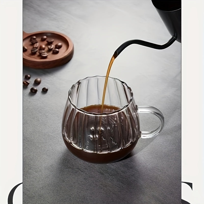 380ml heat-resistant glass coffee cup with handle, clear vertical striped design. Suitable for hot beverages, tea, and milk. Hand wash only. Reusable and recyclable.