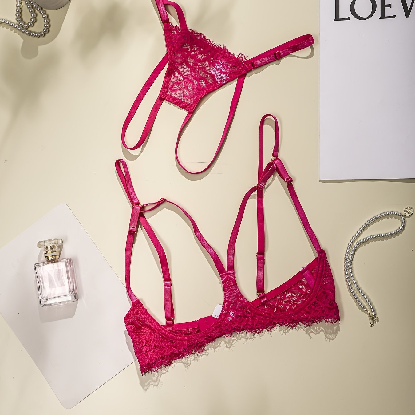 Sexy lace lingerie set with open chest bra and crotchless thong.