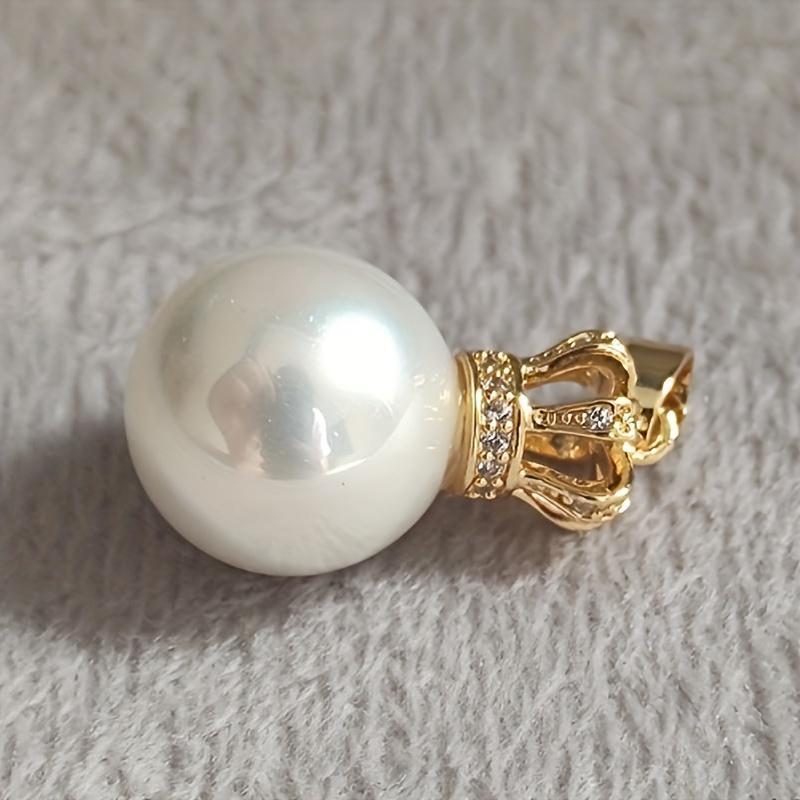 Luxurious Ladies Necklace with Crown Buckle Shell Pearl Pendant in 14K Gold Plating, featuring a 12mm Round Strong Light Pearl. This Noble and Elegant pendant epitomizes luxury, with its flawless design and fashion-forward appeal.