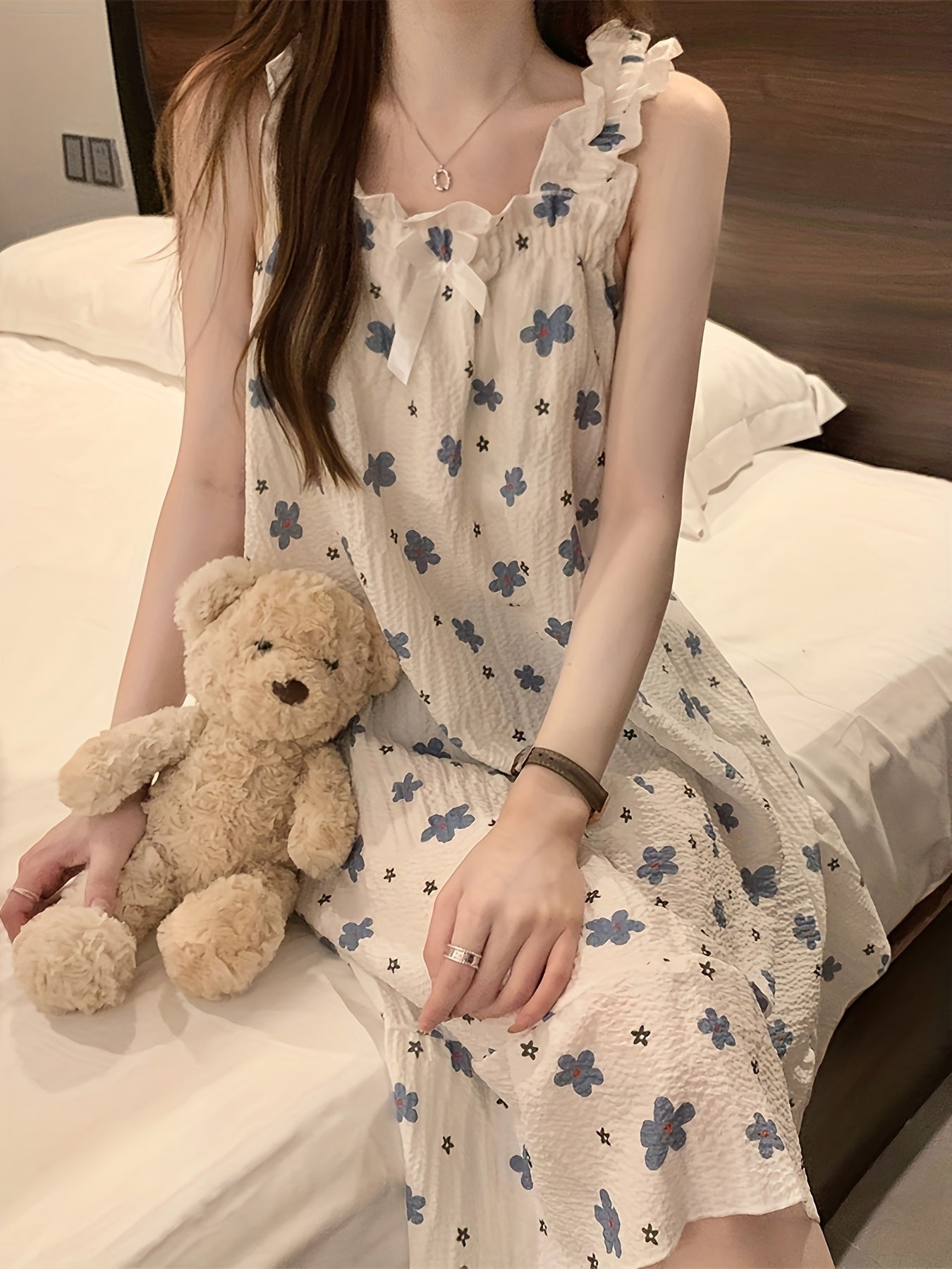 Textured nightgown with floral print and bow, perfect for women's sleepwear.