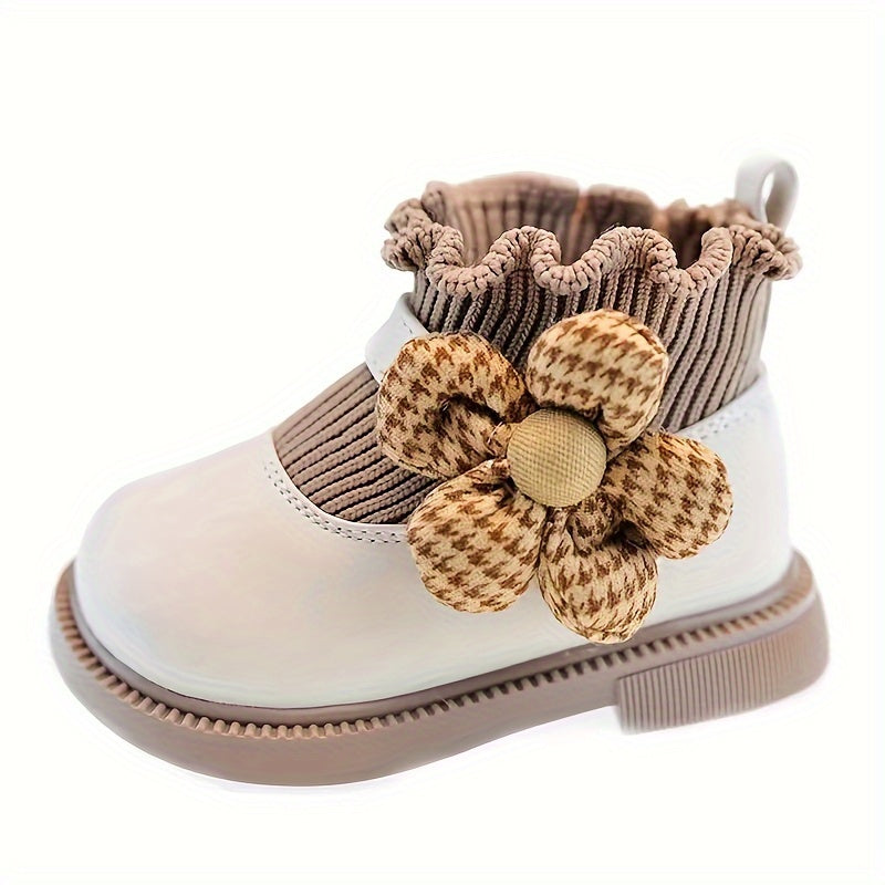 Cute baby shoes with soft soles, ankle-high design, and floral and cloud patterns for any season.