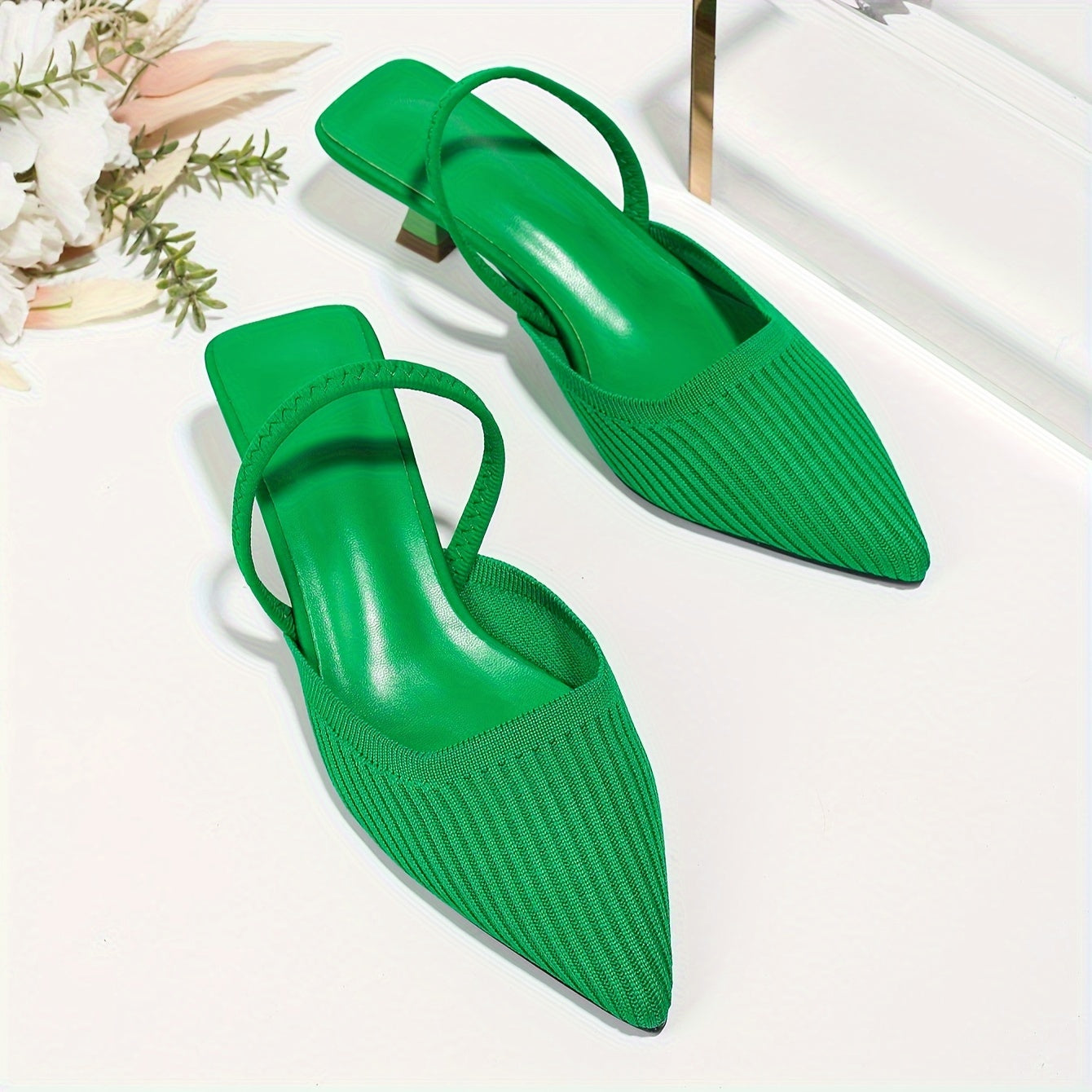 Solid color knit mules for women with flared heel and slingback style, featuring a trendy point toe design for comfort.