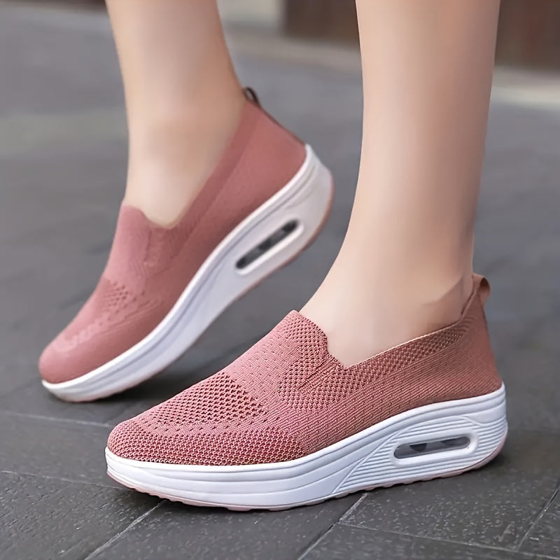 Women's slip-on sneakers from the Spring Collection in solid colors of black, light gray, pink, and dark blue. Features breathable knit fabric, air cushion sole, and low-top design for