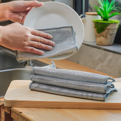 Get a pack of 10/20 stainless steel double-layer wire dishcloths that are perfect for a variety of cleaning tasks. These non-scratch, non-stick, and oil-free cloths can be used on stove surfaces, pots, range hoods, and more. They are versatile mesh