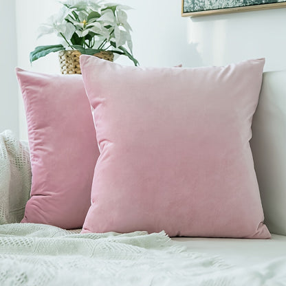 Two golden velvet throw pillow covers, 18x18, for couch or bed.