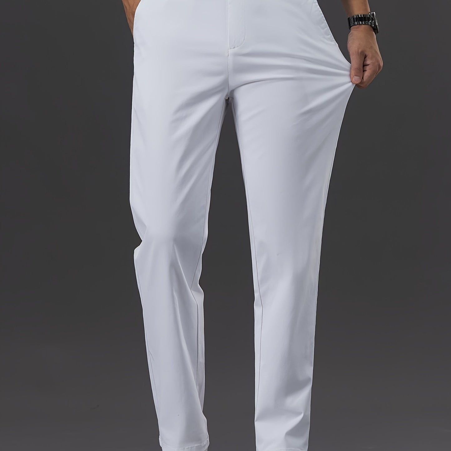 Men's slim-fit cotton blend trousers in solid color, suitable for business casual wear throughout the year. Features micro-elastic fabric, pockets, and regular length.