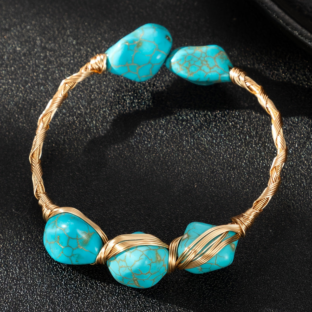 One piece of an exquisite handcrafted copper turquoise bracelet in a bohemian style, featuring a natural stone and adjustable size. Perfect for daily wear and gift-giving, this bracelet is made without any mosaic material.