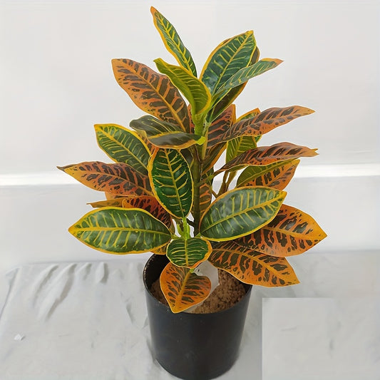 Stylish artificial croton plant with variegated leaves for home decor, perfect for any occasion - pot not included.