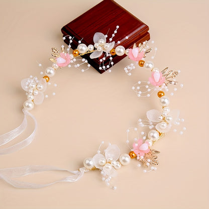 Elegant white plastic headband with floral design for girls, perfect for performances and vacations.