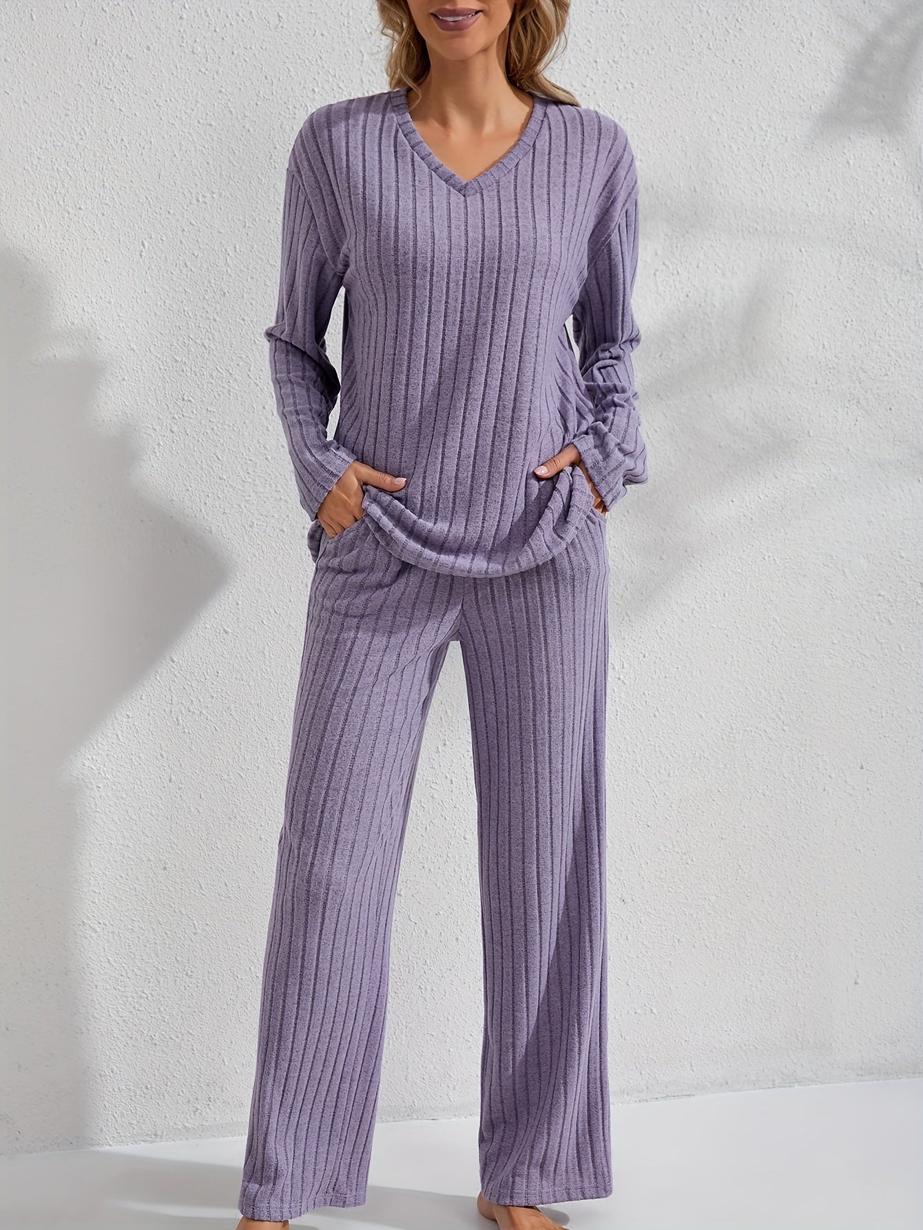 Women's cozy and stylish long sleeve top and pants set for autumn and winter.