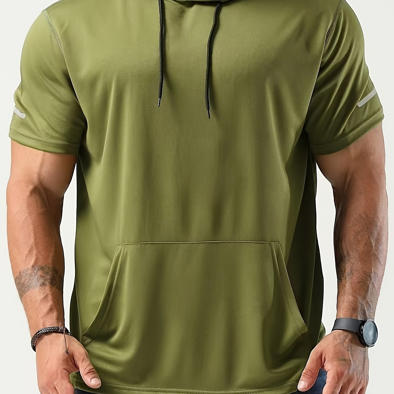 Casual hooded t-shirt for men, ideal for running and workouts, made of breathable polyester with drawstring and reflective detail.