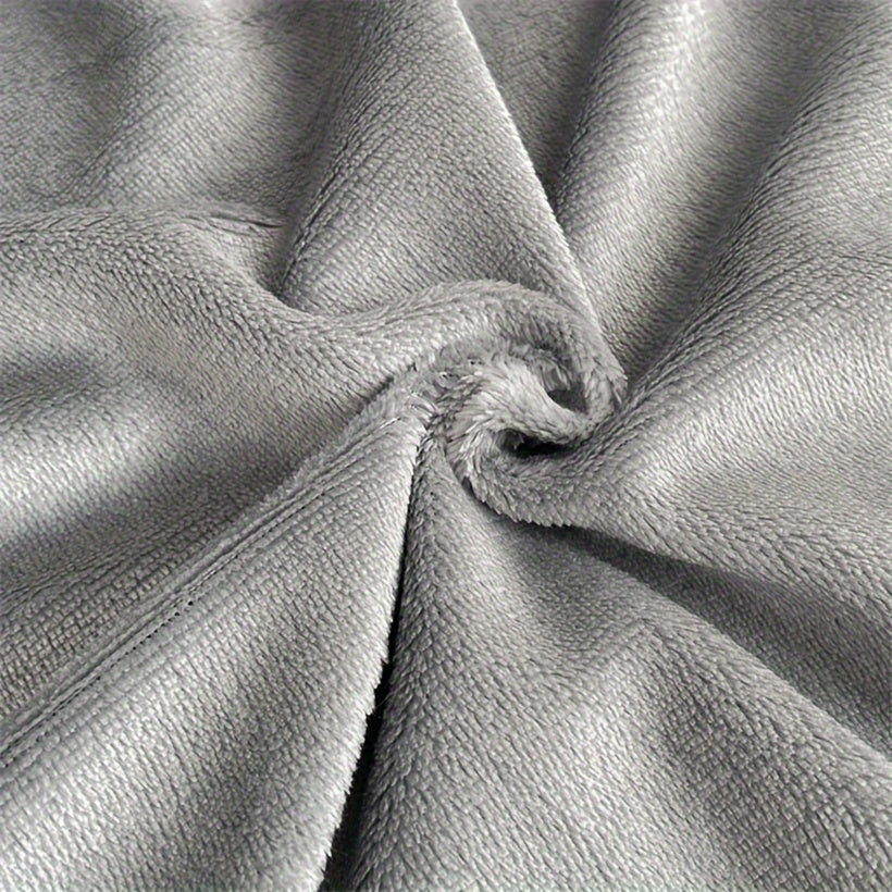 Indulge in the opulence of our Luxurious Plush Fitted Sheet, crafted from ultra-soft milk velvet for a cozy and warm feel. This easy-care sheet is machine washable and features a light gray hue with a deep pocket design for a perfect fit. Ideal for