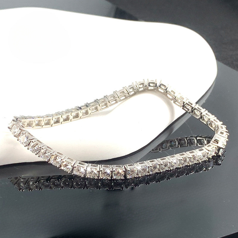 Get your hands on the elegant ConiiW Vintage Luxury Tennis Bracelet made from 925 Sterling Silver with Moissanite stones. This stunning piece is plated with 18K Gold and is a versatile unisex fashion accessory. It comes in a beautiful gift box, perfect