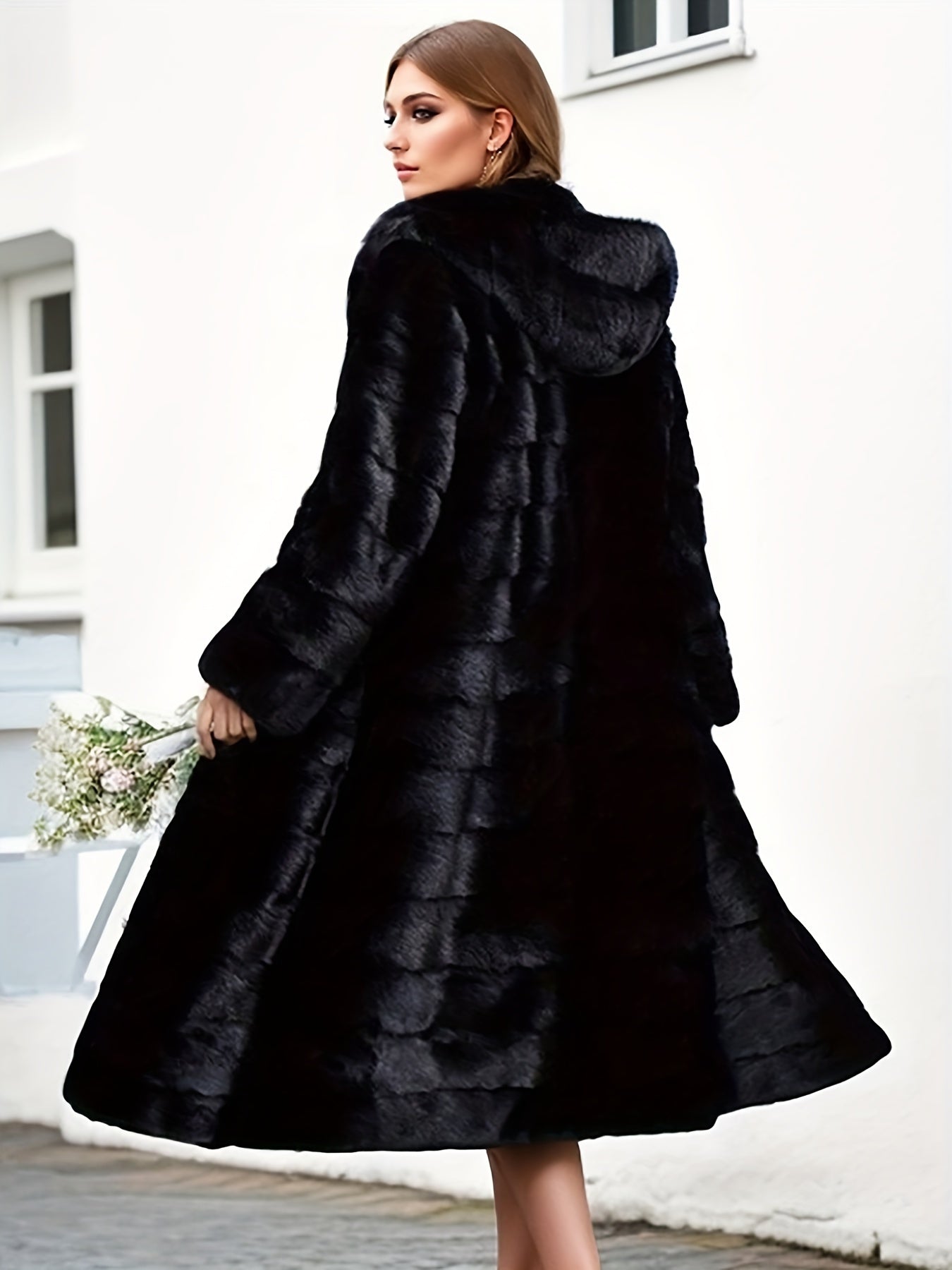 Plus size faux fur coat with pockets and hood, perfect for fall & winter.