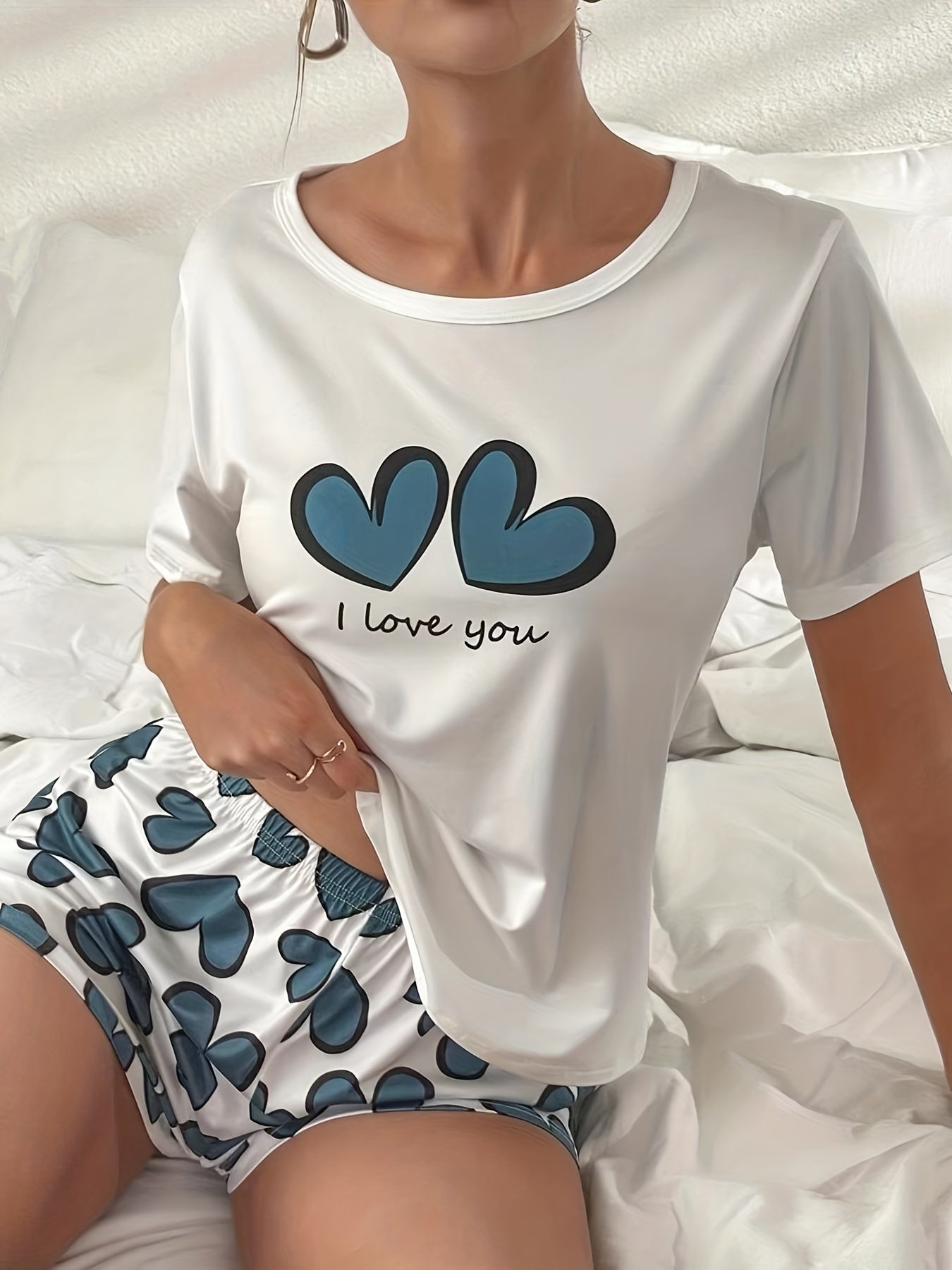 Women's Heart Print Pajama Set with Crew Neck Top and Elastic Waistband Shorts for Sleepwear and Loungewear.