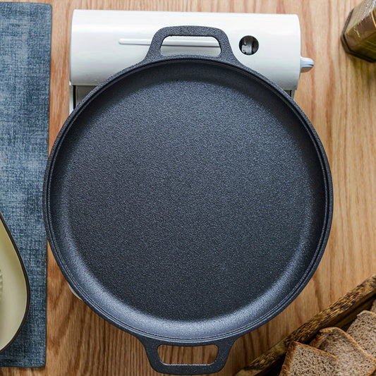 Double-handled non-stick frying pan for pancakes made of cast iron, meant for hand washing, with a durable uncoated surface ideal for cooking crepes and flatbreads.