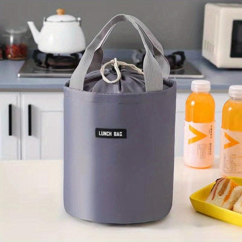 The versatile 1pc Twill Cylinder Bento Bag is perfect for outdoor picnics, with an included ice pack to keep your food fresh. This waterproof bag also doubles as a lunch box, making it ideal for back to school or college. Hand washable and insulated