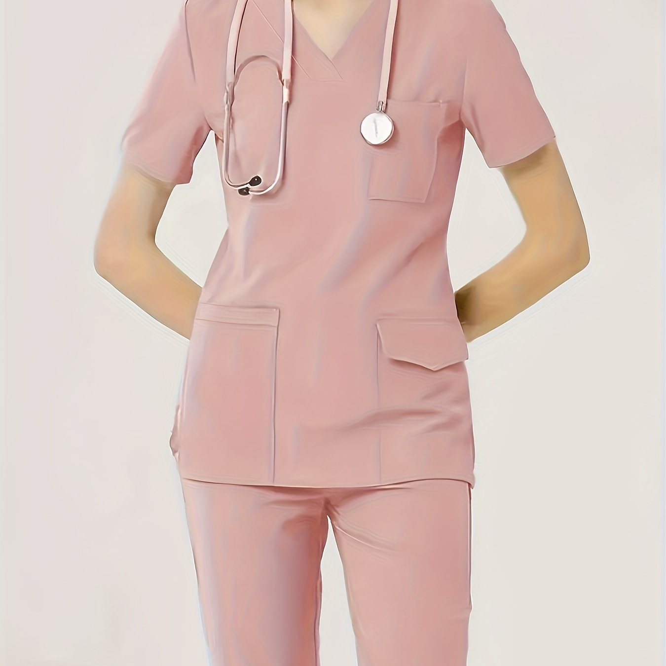 Women's two-piece healthcare uniform with a V-neck top, stretchy fabric, dental scrub gloves, functional pockets, and comfortable fit.