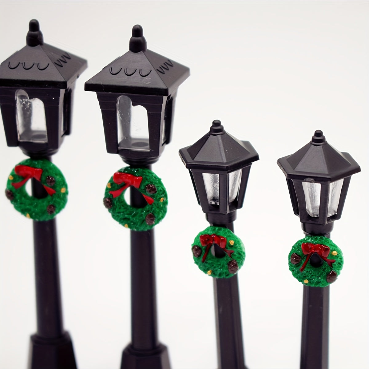 3 Miniature Christmas Lamp Posts with Wreaths, Collectible Seasonal Figurines, Plastic Material, No Electricity Needed