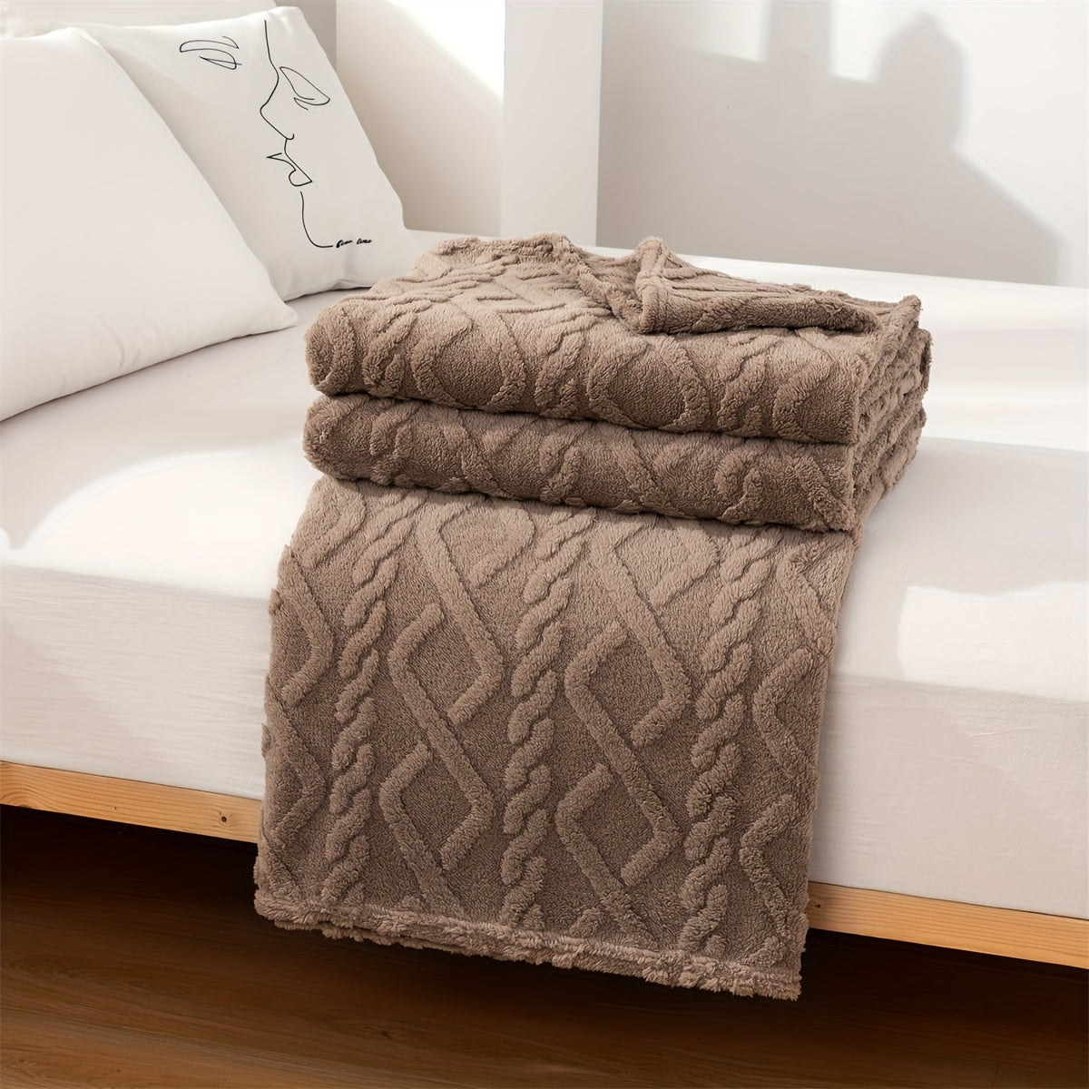 A cozy and versatile blanket with a sweater-like embossed design, perfect for New Year's, Chinese New Year, Valentine's Day, Mother's Day, and back-to-school occasions.