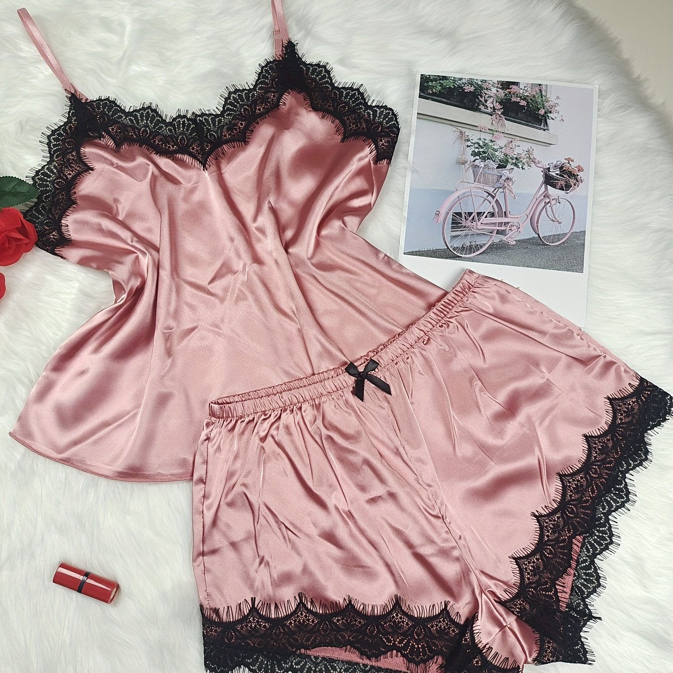 Women's sexy pajama set with V-neck, off-shoulder design, lace trim, and soft polyester blend for year-round comfort.