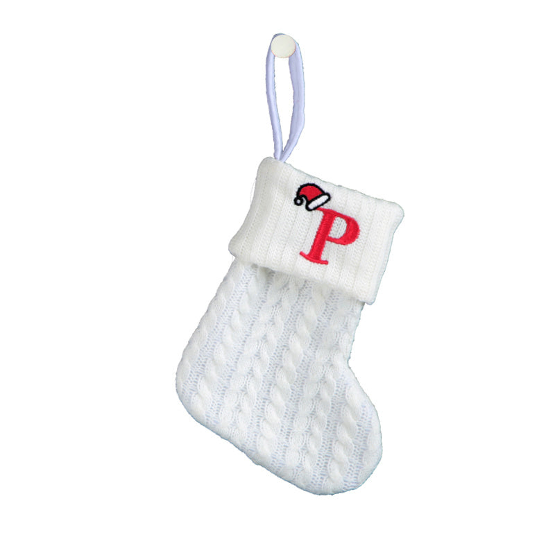 White cable knit stocking with embroidered 'F' - Ideal for indoor decor.