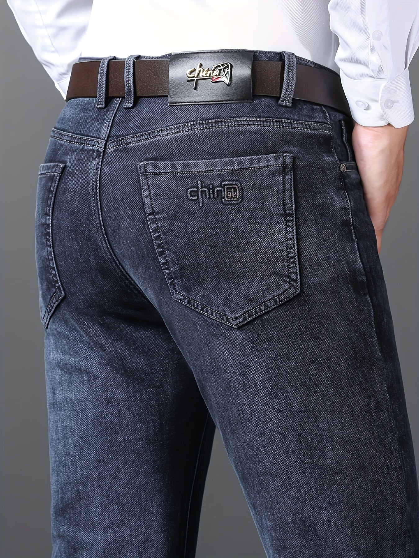 Men's semi-formal stretch denim pants with classic straight leg design and pockets, ideal for fall and winter.