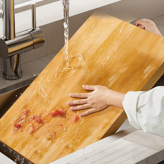 Essential for your kitchen, this large Bamboo Double-Sided Chopping Board measures 30cm x 20cm, perfect for both cooking and serving.