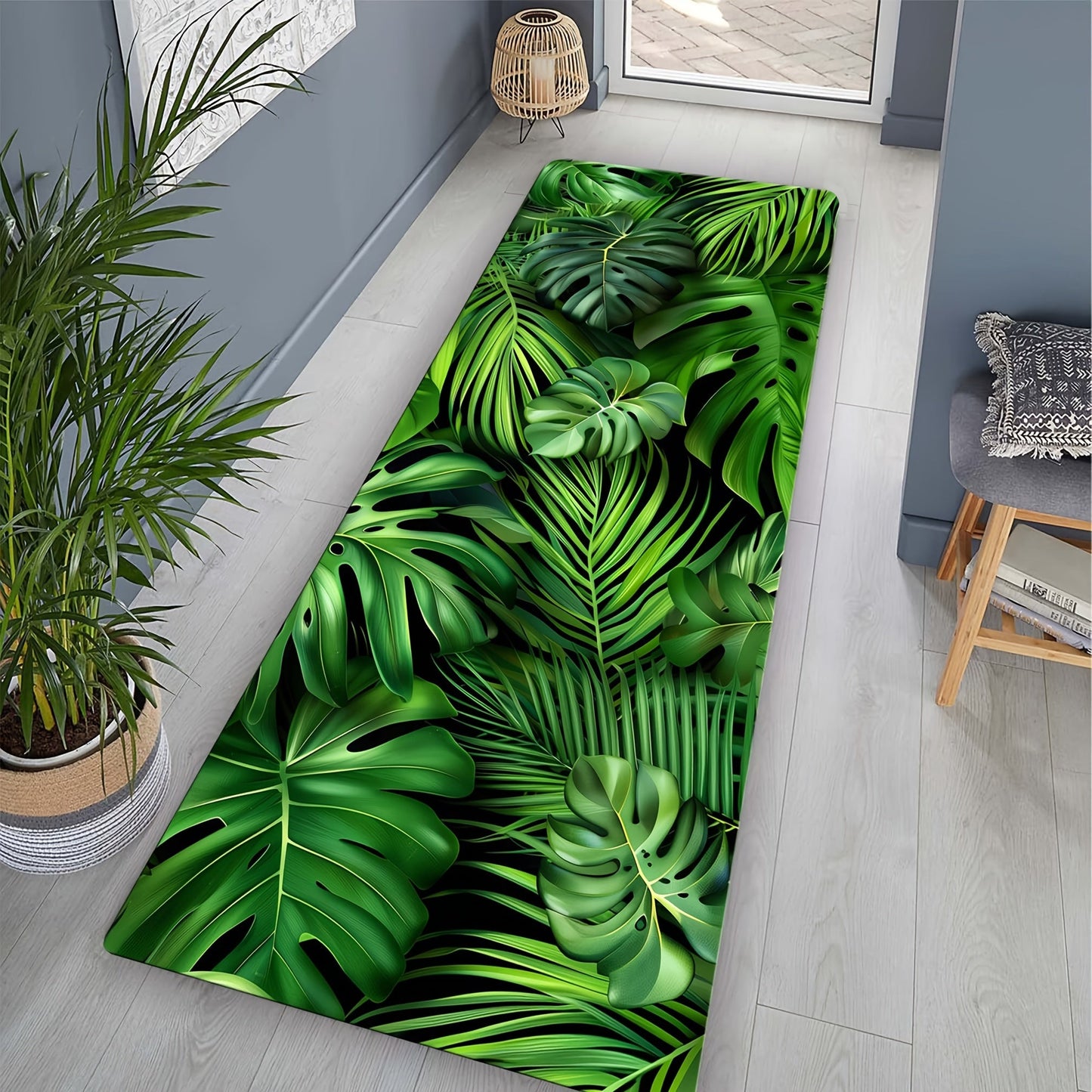 Soft non-slip area rug for living room and kitchen featuring a green leaf pattern. Machine made from polyester, this braided mat is hand wash only. It is in a rectangle shape with a weight of 480gsm and a thickness of 1cm.