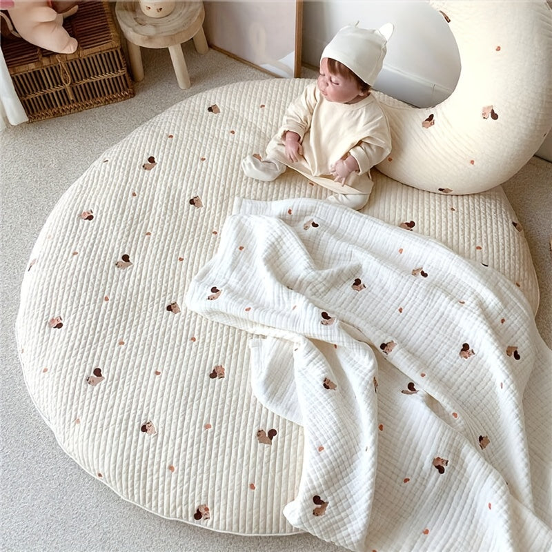 Circular crawling mat made of breathable cotton, perfect for both playtime and room decoration. This soft and plush mat is removable and washable, with intricate embroidery for added style.