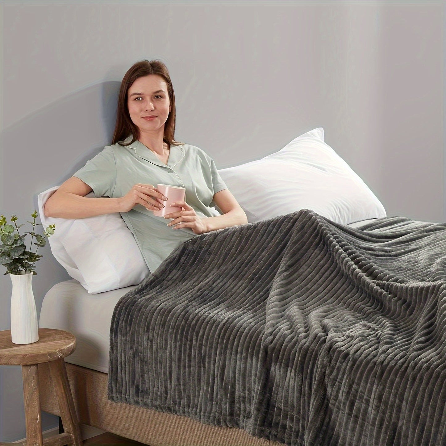 Stay cozy and warm with our Ultra-Soft Oversized Fleece Throw Blanket. Made with lightweight and warm 280GSM microfiber, this blanket features a 3D ribbed Jacquard design for added style. Hypoallergenic and perfect for all seasons, this blanket is a