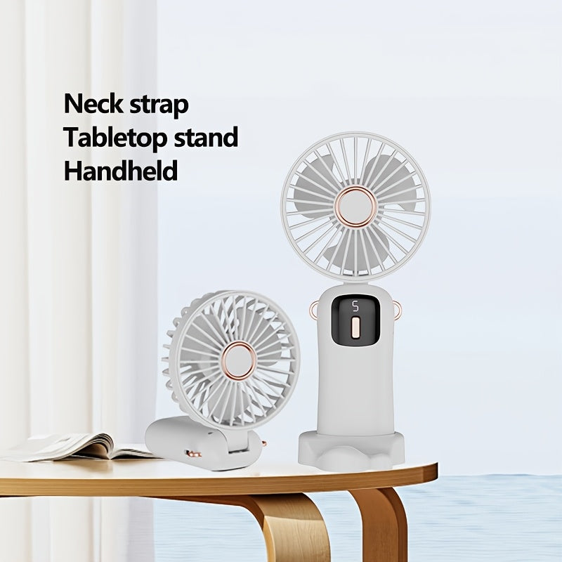 Rechargeable USB Handheld Fan with Quiet Operation and Foldable Neck Design, Ideal for Desk, Office, Bedroom, Outdoor Travel, Camping, and School. Features High-Velocity Cooling, 1200mAh Lithium Battery, Wearable Design, and Easy Button Control. Perfect