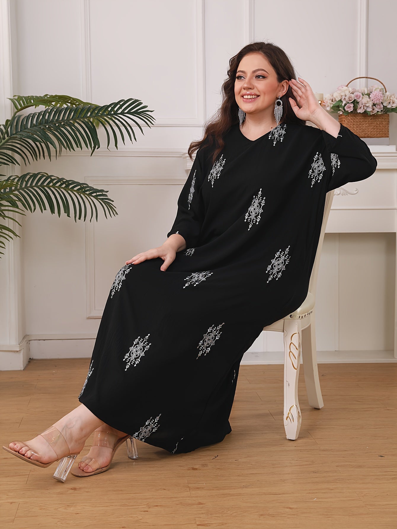 Stylish embroidered maxi dress with 3/4 sleeves, loose fit, woven polyester, machine washable, ideal for summer.