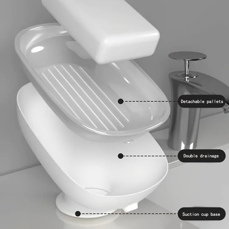 Suction cup soap dish with drainage for bathroom and kitchen sink storage.