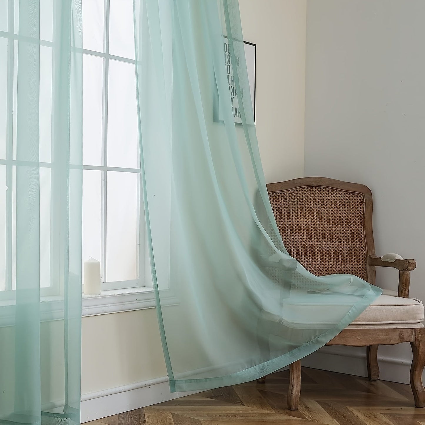 Two panels of sheer curtains with a basic rod pocket design, perfect for adding a touch of elegance to your bedroom, office, living room, yard, kitchen, or any other space in your home.