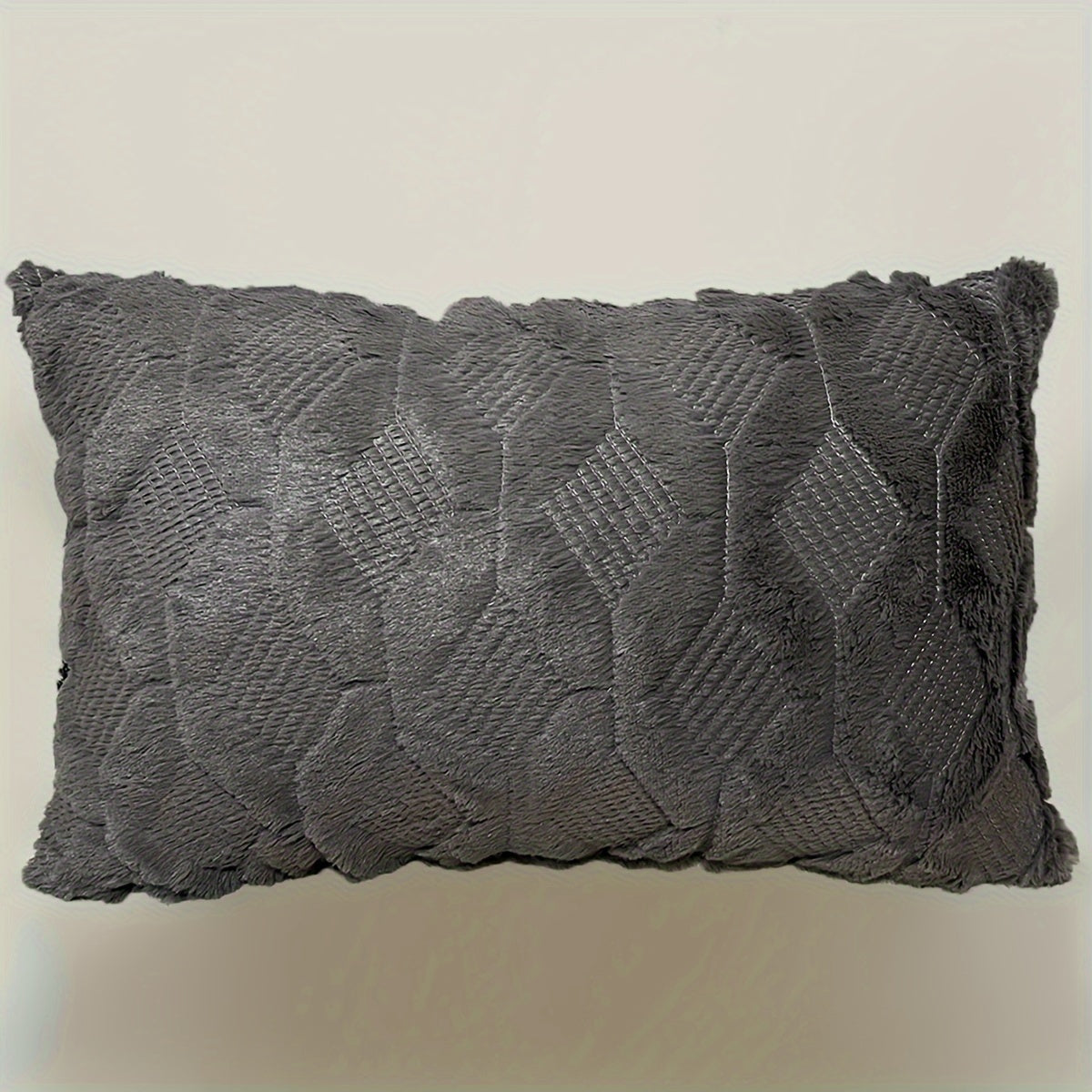 Indulge in the luxurious comfort of our Ultra-Soft Plush Diamond Quilted Throw Pillow Cover. Featuring a solid color back and a zip closure for easy removal, this cozy and comfortable cover is the perfect addition to your living room, bedroom, or sofa