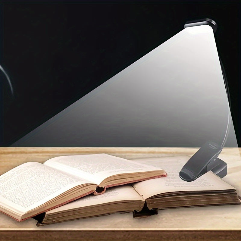 Portable battery-powered clip-on book light for reading that can also be used as a small table lamp or night light for room decor.