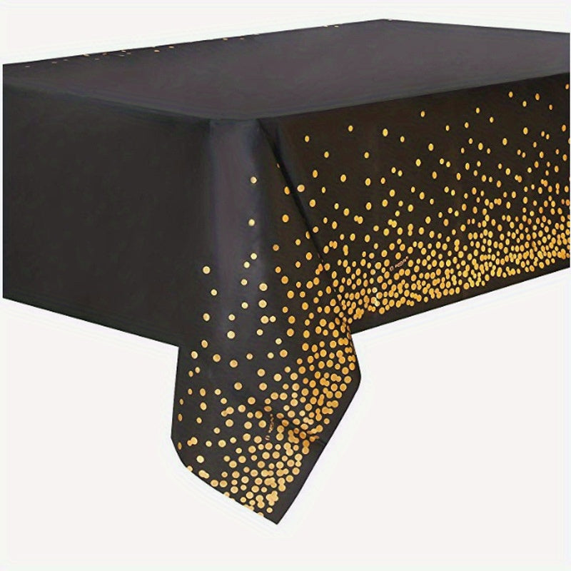 Disposable golden dot waterproof tablecloth, 137x274cm, for parties and events.