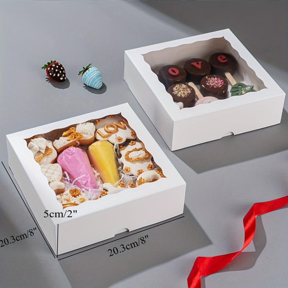 White bakery boxes with window in dimensions of 20.32x20.32x5.08 cm, available in sets of 6, 15, and 30. Suitable for packaging chocolate covered strawberries, cookies, pies, charcuterie, cakesickles, treats, and pretzels.