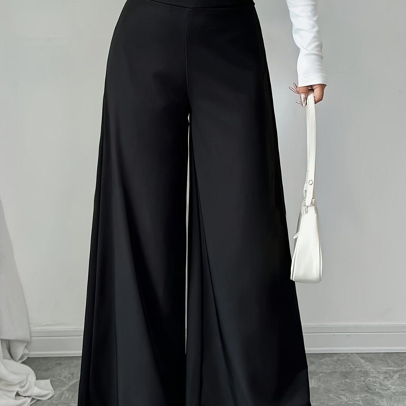 Black high-waisted wide leg pants with decorative buttons for spring & summer, machine washable & chic