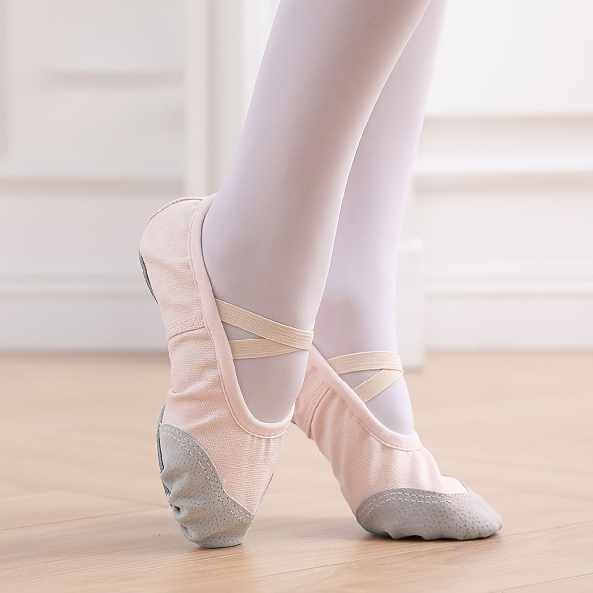 Soft sole ballet dance shoes for youngsters, perfect for yoga and training, with slip-on, non-tie design and leather sole for boys and girls.