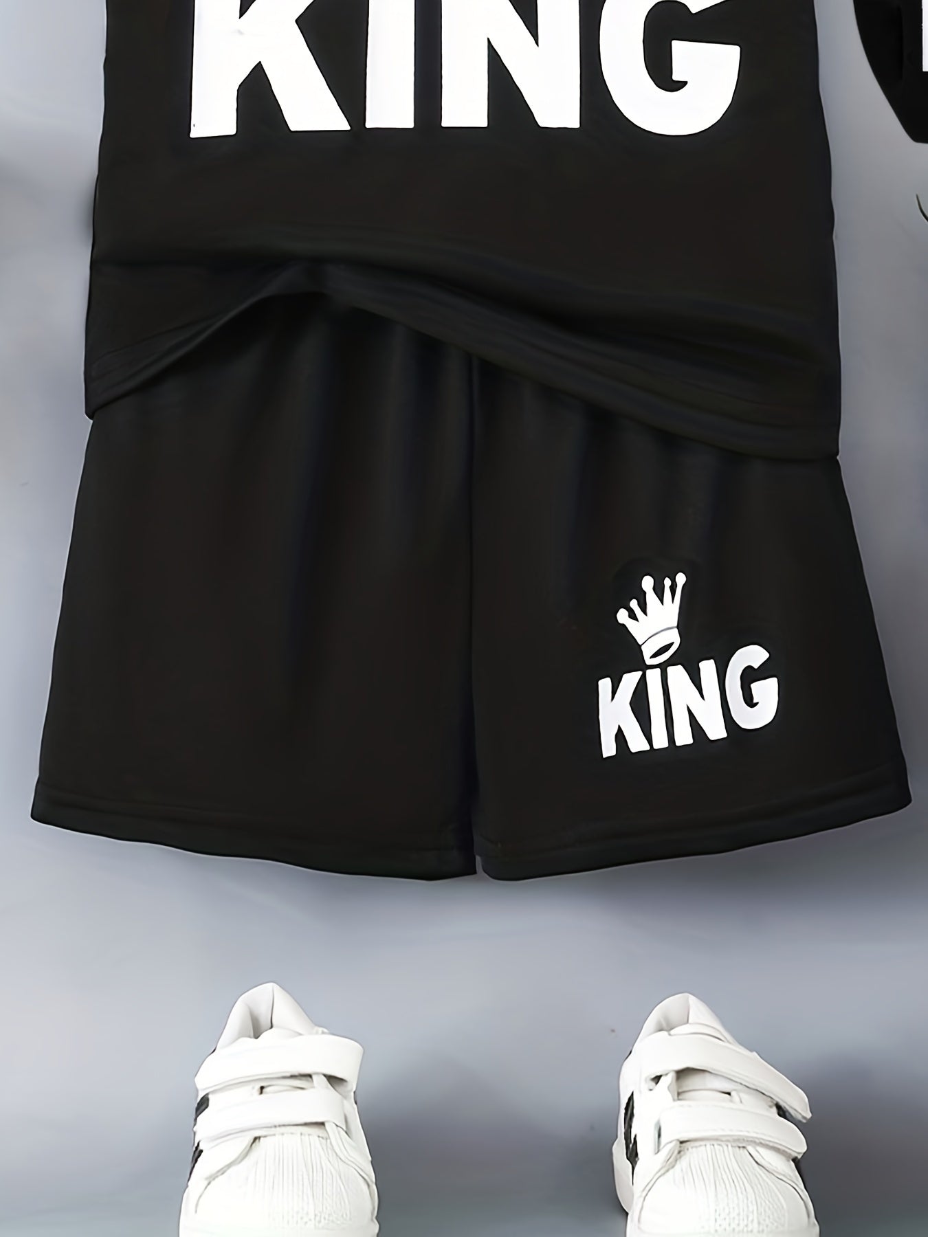 Boys' "KING" Crown Print Casual Outfit Set in Black - includes T-shirt, shorts, and crossbody bag. Made of 100% polyester, machine washable. Ideal for spring/summer, outdoor activities.