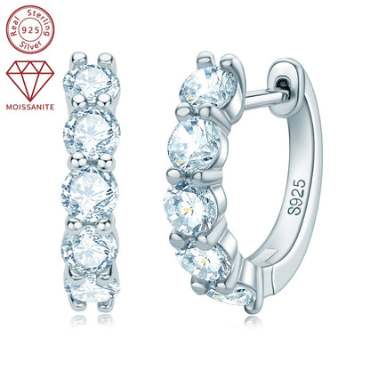 These women's fashion earrings feature a classic daily style, crafted with 925 silver and set with 10 pieces of 3.5mm moissanite stones, each weighing 1.0ct. The total weight of the earrings is 3.39g. These round synthetic moissanite earrings are a