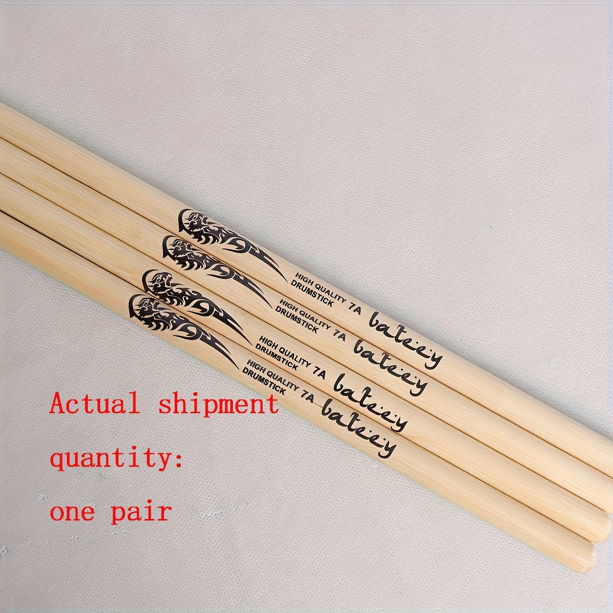 Lightweight drumsticks with totem design, selectable sizes 5A, 7A, and 5B. Made of high-quality natural wood with a precision grip, uncharged pair.