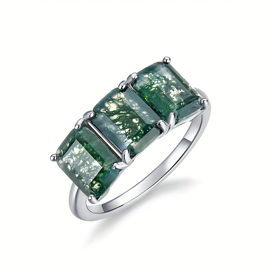 Handcrafted with elegance, the ALLNOEL Simple 925 Sterling Silver Ring features a natural Moss Agate gemstone in a square 6*8mm cut, making it the perfect June birthstone for daily wear or special occasions. This piece exudes sophistication and charm