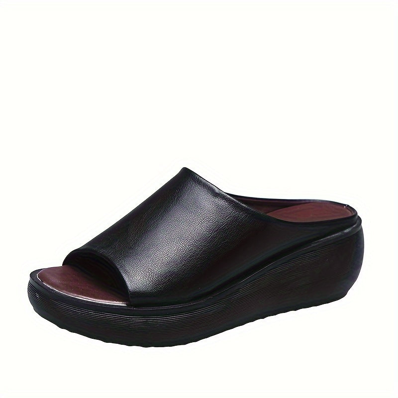 Stylish and comfortable women's wedge slides with open toe and soft sole, perfect for vacations.