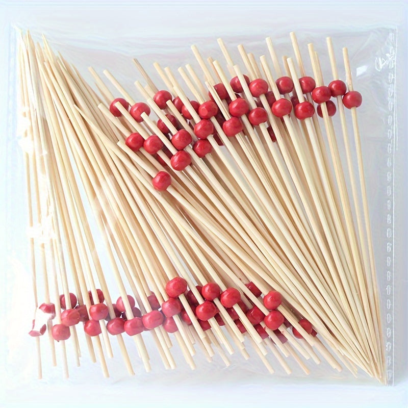 100 high-quality bamboo cocktail picks with red beads - disposable fruit skewers for parties, bars, desserts, and outdoor gatherings.